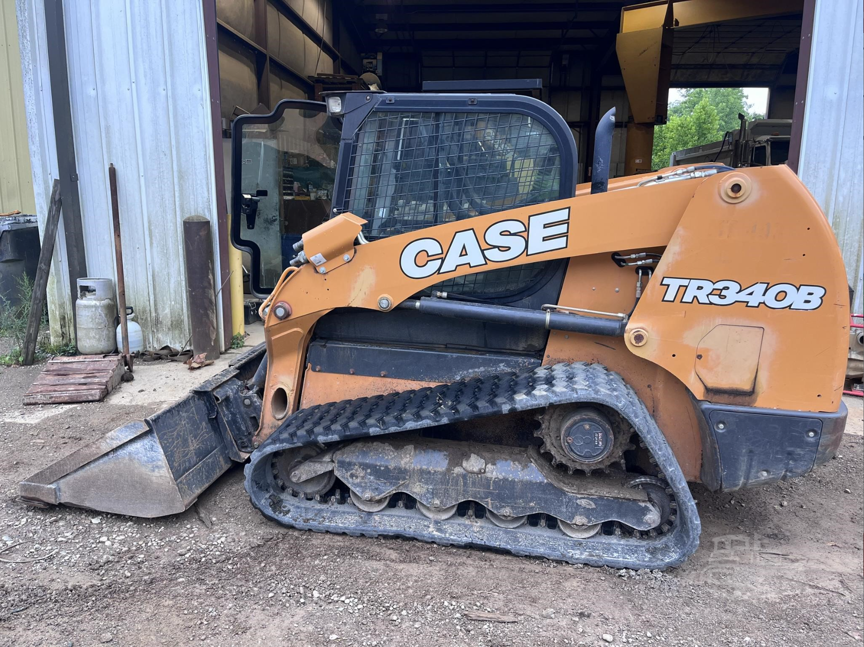 Orange Case TR340B tracked loader with bucket