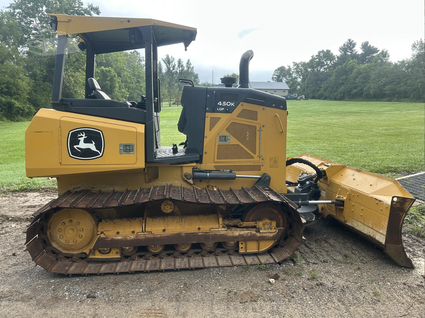 Yellow dozer with blade